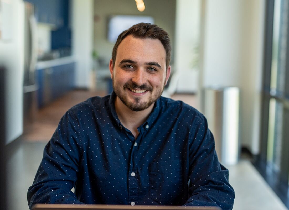 Matt sitting in office
