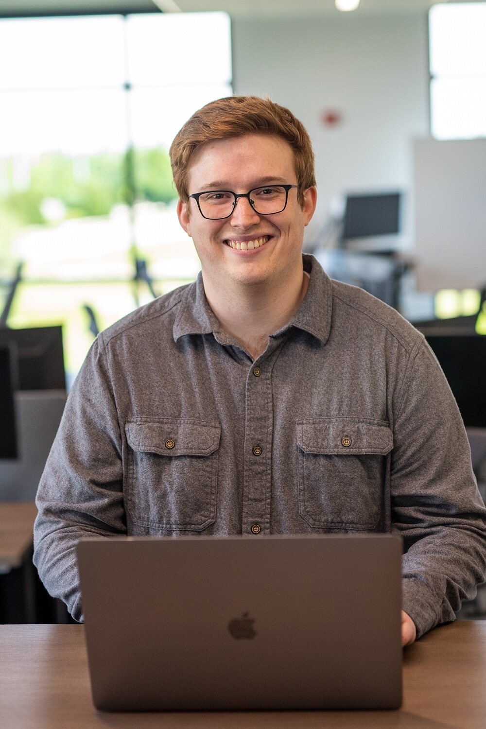 Ryan Lesley Working with laptop