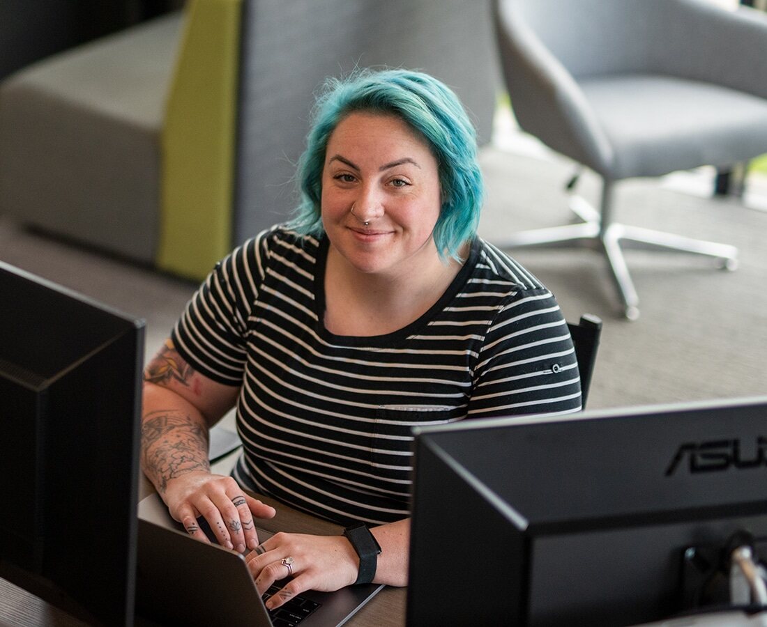 Tori sitting at desk